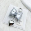 Shimmering Heart Bow Bag Charm 1 Shimmering Heart Bow Bag Charm -Bobby Sales O1CN01qI5awZ20rd0IDkWkT 2215108276903 0 cib